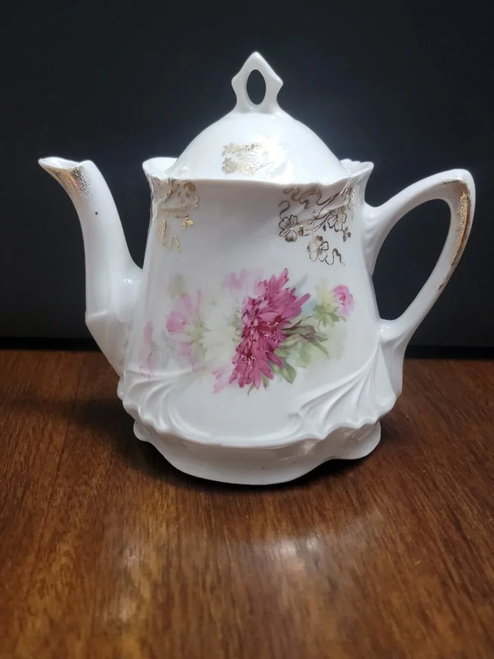 Vintage floral porcelain teapot with lid